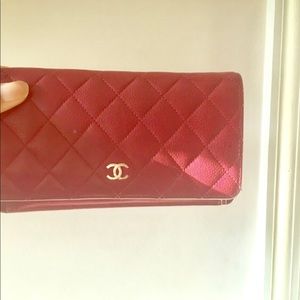 Fairly used Chanel wallet with bag and receipt,